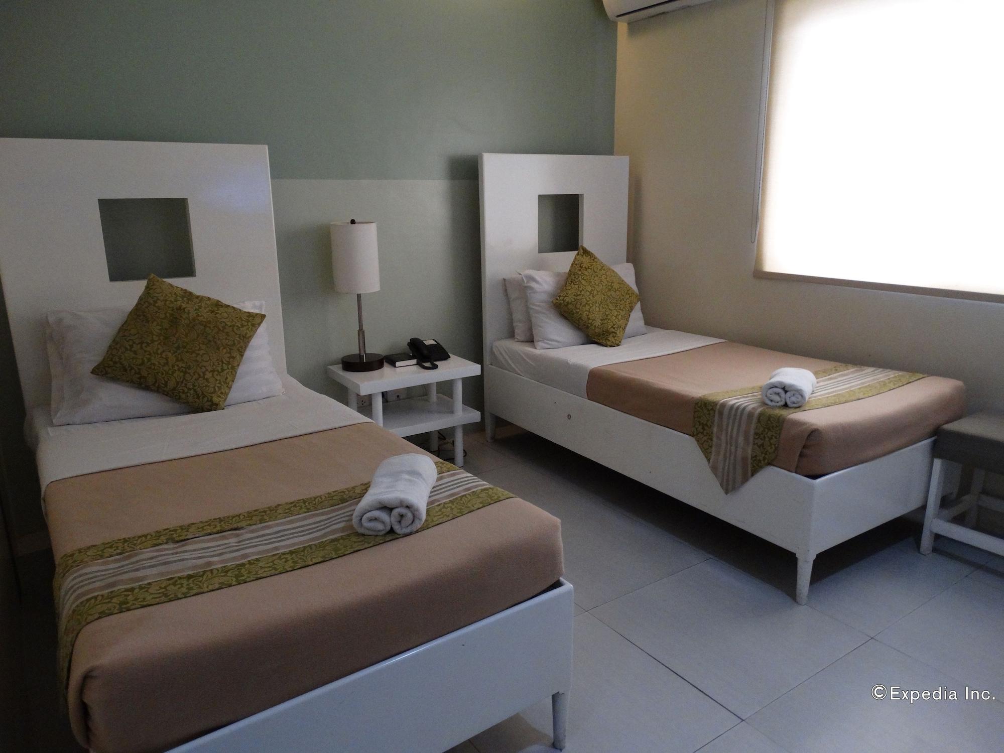 Empire Suites Hotel Puerto Princesa Exterior foto