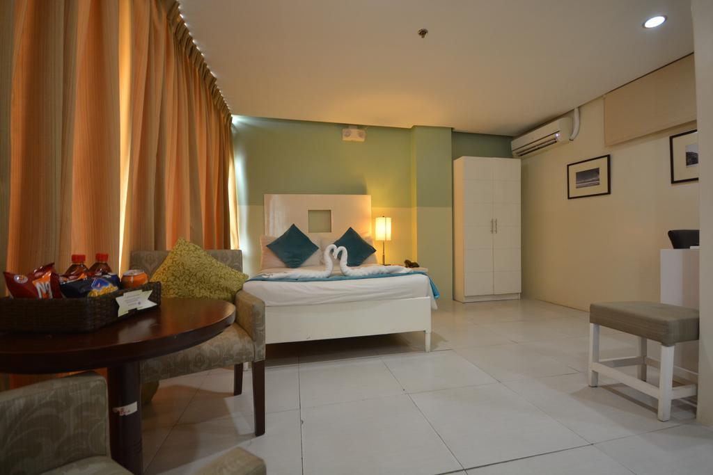 Empire Suites Hotel Puerto Princesa Exterior foto